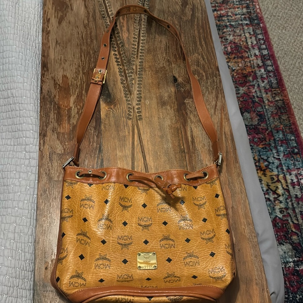 EUC MCM Visetos Cognac Nappa Leather Monog Drawstring Bucket Bag